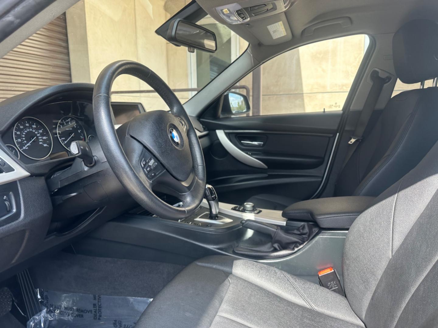 2017 Gray /Black BMW 3-Series Leather (WBA8E1G34HN) with an 4 Cylinder engine, Automatic transmission, located at 30 S. Berkeley Avenue, Pasadena, CA, 91107, (626) 248-7567, 34.145447, -118.109398 - Low Miles!! This 2017 BMW 3-Series 320i Sedan looks and drives well. Looking for a top-notch sedan in Pasadena, CA? Your search ends here! Feast your eyes on our remarkable 2017 BMW 3-Series 320i Sedan with only 54,413 miles on the odometer. This is considered low mileage, providing assurance of its - Photo#12